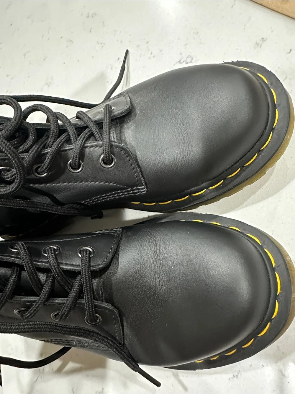 Dr. Martens Black Leather Lace-Up Boots with Yellow Welt Stitching